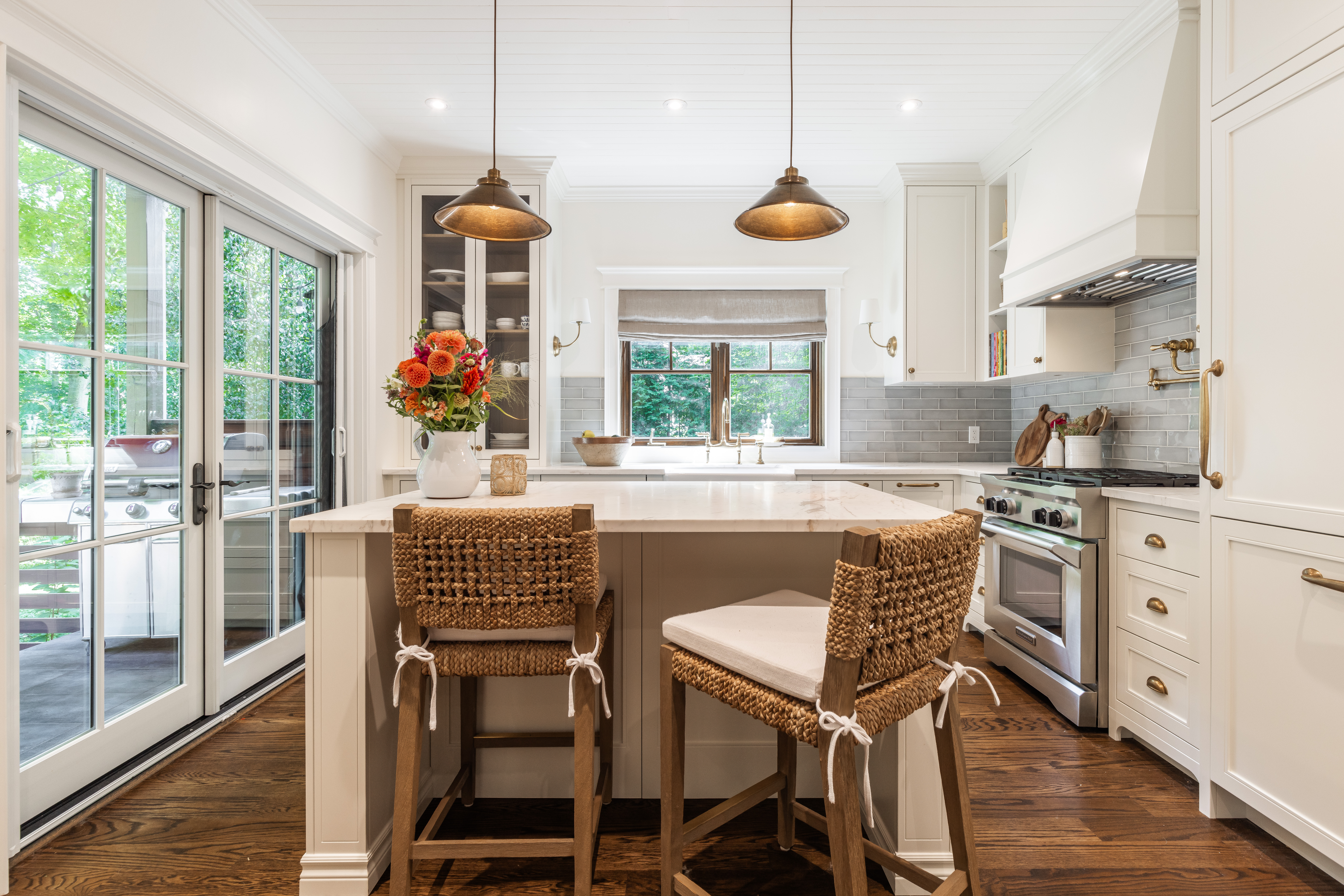 Experience a blend of modern elegance and rustic charm in this inviting kitchen, filled with natural light and perfect for social gatherings.