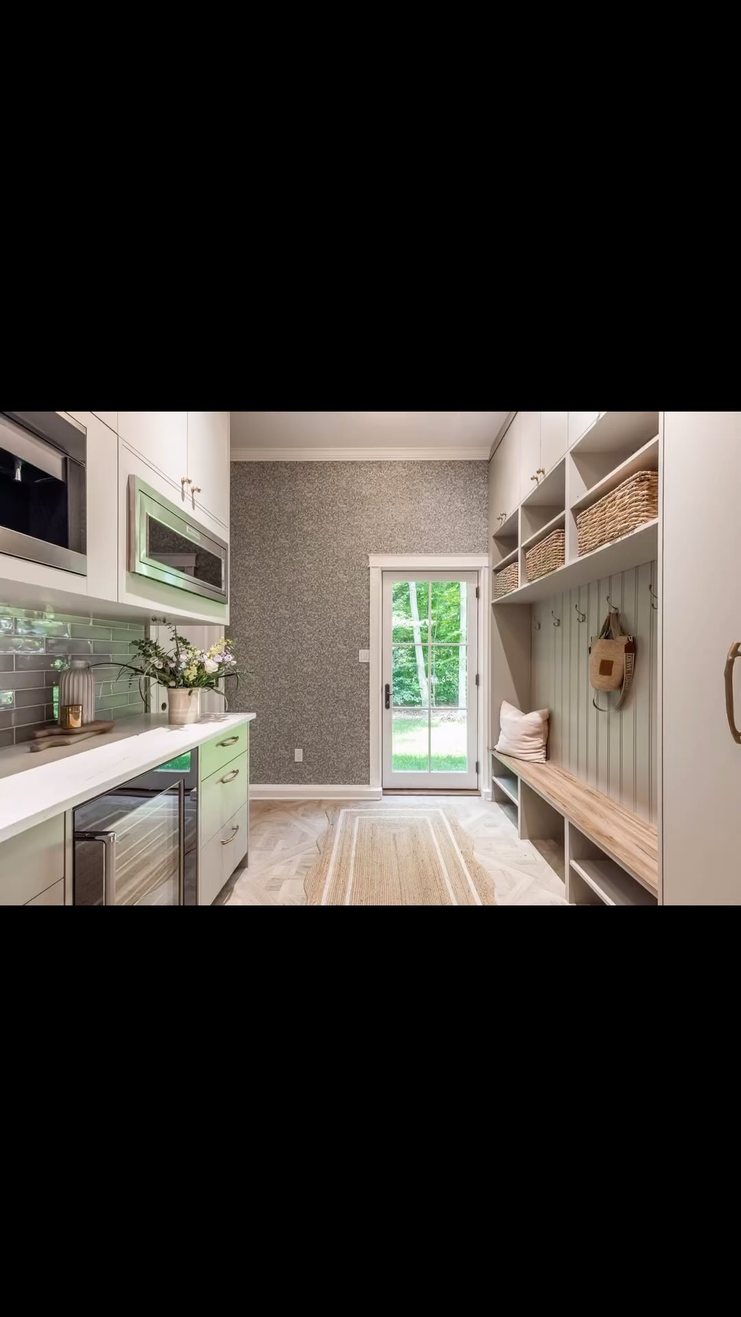 Modern kitchen and elegant hallway design blend functionality with natural light and stylish storage solutions for a welcoming atmosphere.
